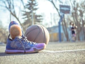 close up photography of shoes near ball